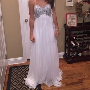 White and silver full length strapless gown